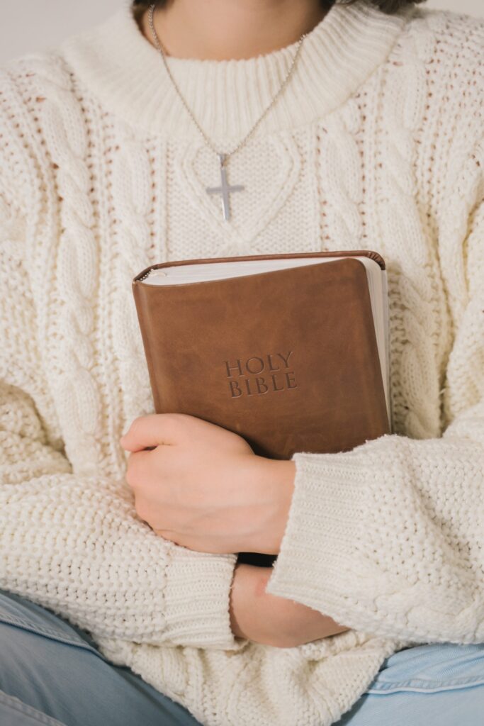 Woman Holding Holy Bible
